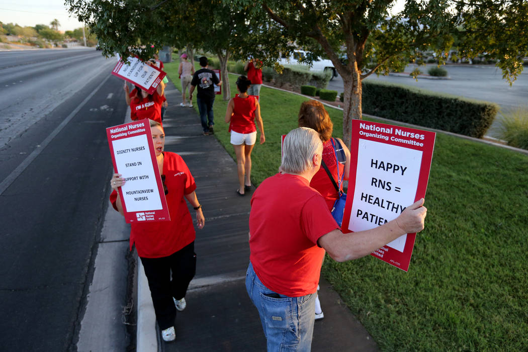 Nurses and supporters affiliated with the Nevada chapter of the national Nurses Organizing Committee protest outside MountainView Hospital in Las Vegas Tuesday, July 24, 2018, to address what they ...