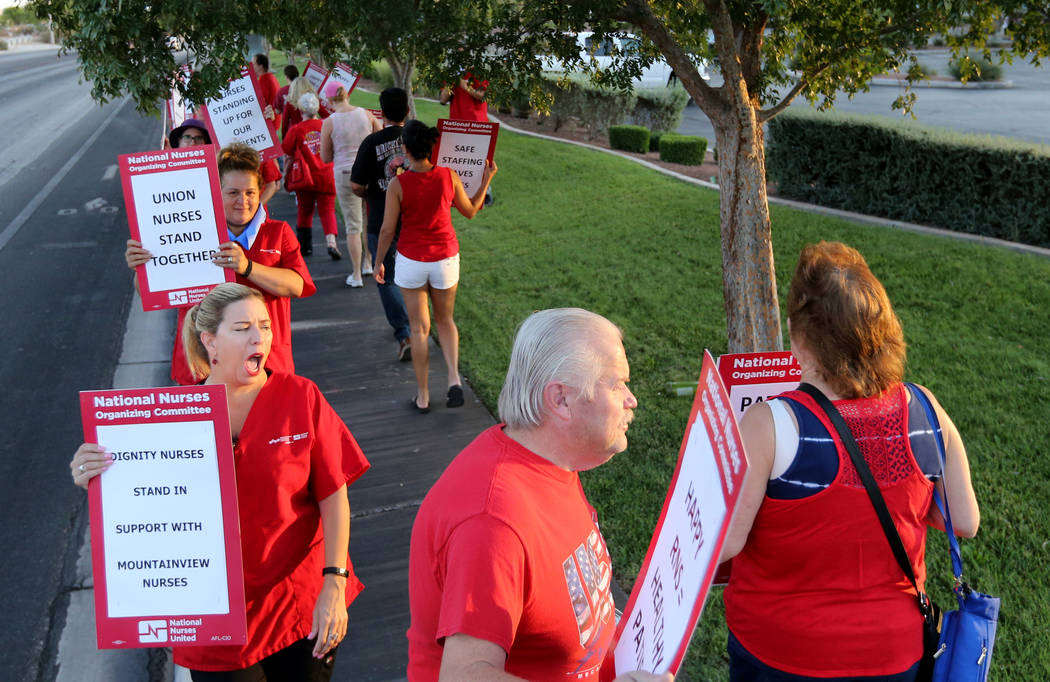 Nurses and supporters affiliated with the Nevada chapter of the national Nurses Organizing Committee protest outside MountainView Hospital in Las Vegas Tuesday, July 24, 2018, to address what they ...