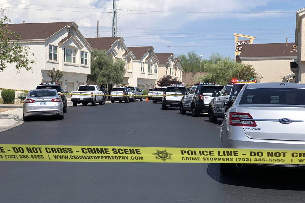 Las Vegas police investigate the death of a woman found unresponsive inside her home in the 4600 block of Dealers Choice Way on Saturday, July 14, 2018 in Las Vegas. (Rio Lacanlale/Las Vegas Revie ...