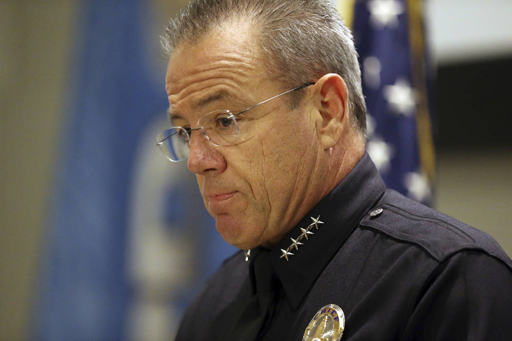 Los Angeles Police Chief Michel Moore speaks at a news conference at police headquarters Tuesday, July 24, 2018, in Los Angeles, where he announced that a store worker killed in a gun battle befor ...