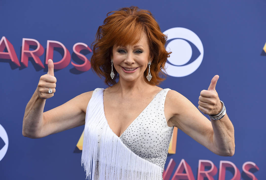 Reba McEntire arrives at the 53rd annual Academy of Country Music Awards at the MGM Grand Garden Arena in Las Vegas, April 15, 2018. (Jordan Strauss/Invision/AP, File)