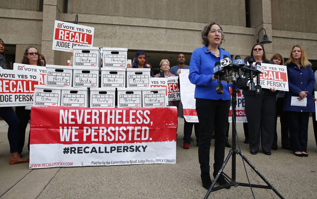 FILE - In this Jan. 11, 2018, file photo, Stanford University law professor Michele Dauber leads a rally before handing signed petitions to place the recall of Santa Clara County Judge Aaron Persk ...