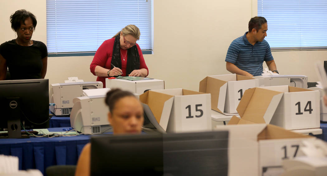 Clark County election workers count mail-in ballots at election headquarters in Las Vegas Tuesday, June 26, 2018. K.M. Cannon Las Vegas Review-Journal @KMCannonPhoto
