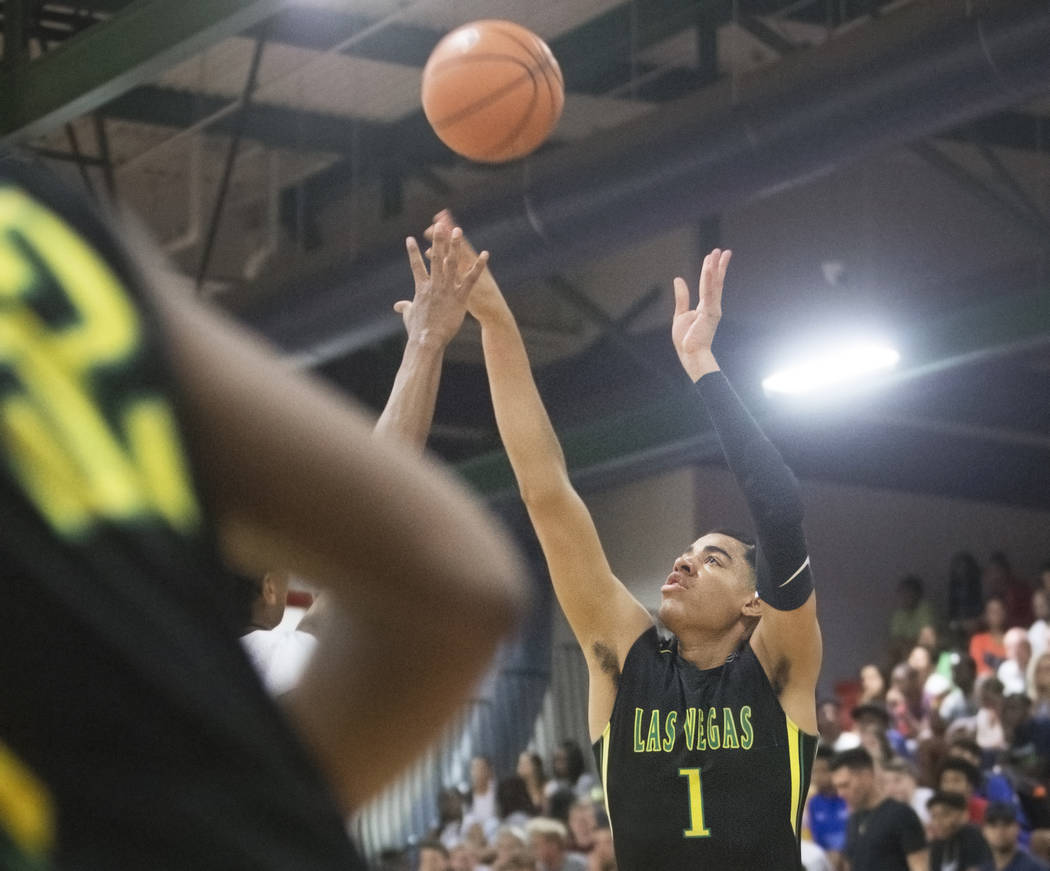 Las Vegas Prospects guard Julian Strawther (1) shoots a corner jump shot in the first half during his game against the Seattle Rotary at the Made Hoops Summer Showcase on Wednesday, July 25, 2018, ...