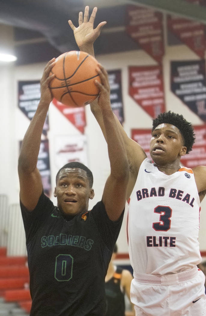Oakland Soldiers guard Gianni Hunt (0) drives past Bradley Beal Elite guard Caleb Love (3) in the first half during the Made Hoops Summer Showcase on Wednesday, July 25, 2018, at Liberty High Scho ...