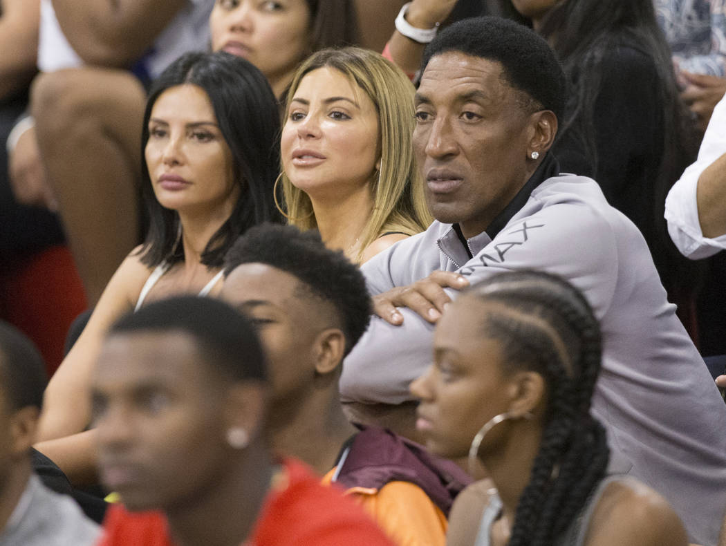 Scottie Pippin, right, a six-time NBA champion with the Chicago Bulls, watches his son compete in the Made Hoops Summer Showcase on Wednesday, July 25, 2018, at Liberty High School, in Las Vegas. ...