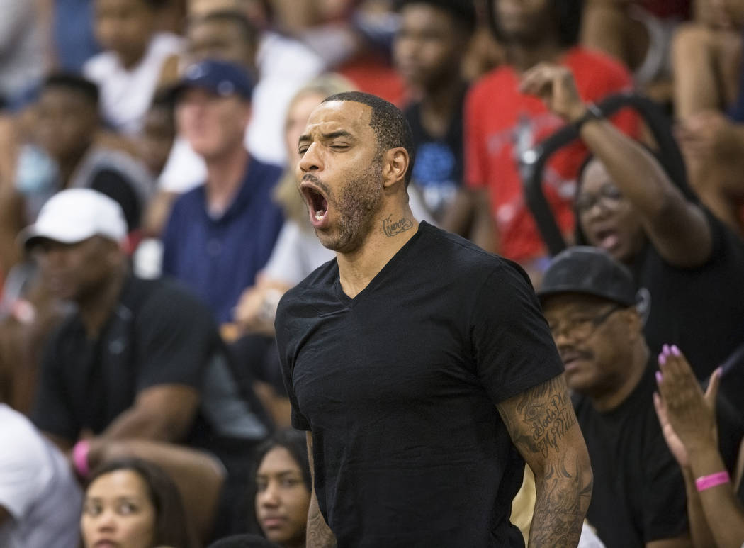 Kenyon Martin, a 15-year NBA veteran, cheers for his son Kenyon Martin Jr during the Made Hoops Summer Showcase on Wednesday, July 25, 2018, at Liberty High School, in Las Vegas. Benjamin Hager La ...