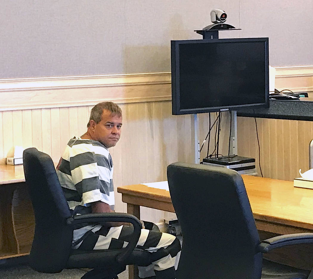 John K. O'Connor looks back before the judge reads an indictment in justice court, Wednesday, July 25, 2018 in Fallon. O'Connor has been indicted on murder, battery and assault charges for fatally ...