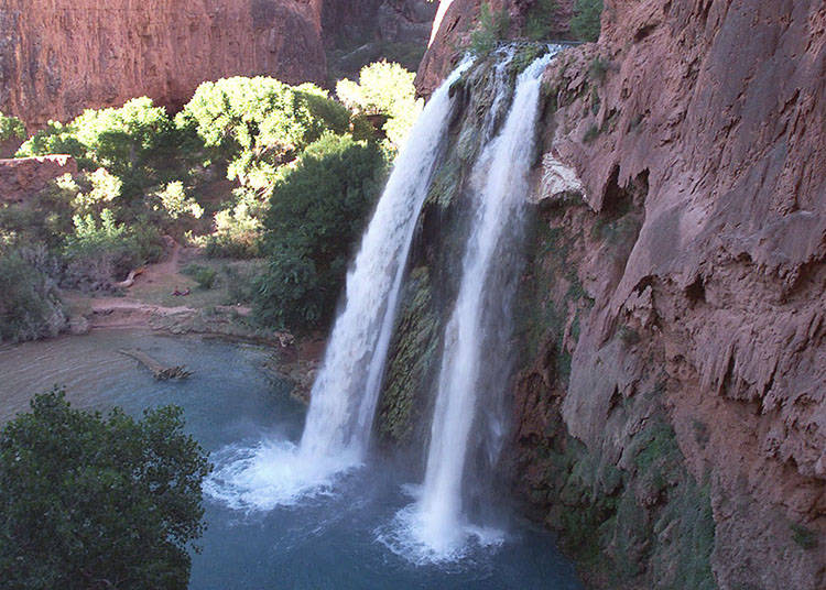 Havasu Creek's blue-green waters tumble 210 feet on the Havasupai Tribe's reservation in a southeastern branch of the Grand Canyon near Supai, Arizona. (Bob Daugherty/The Associated Press)