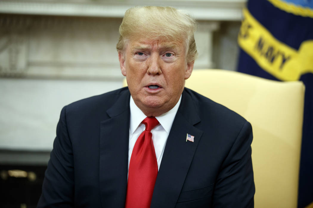 President Donald Trump speaks during a meeting with European Commission president Jean-Claude Juncker in the Oval Office of the White House, Wednesday, July 25, 2018, in Washington. (AP Photo/Evan ...