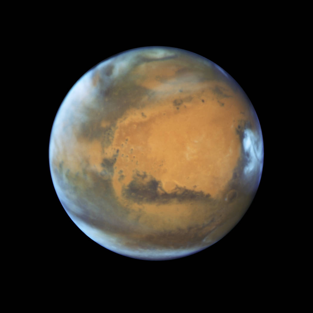 This May 12, 2016 image provided by NASA shows the planet Mars. A study published Wednesday, July 25, 2018 in the journal Science suggests a huge lake of salty water appears to be buried deep in M ...