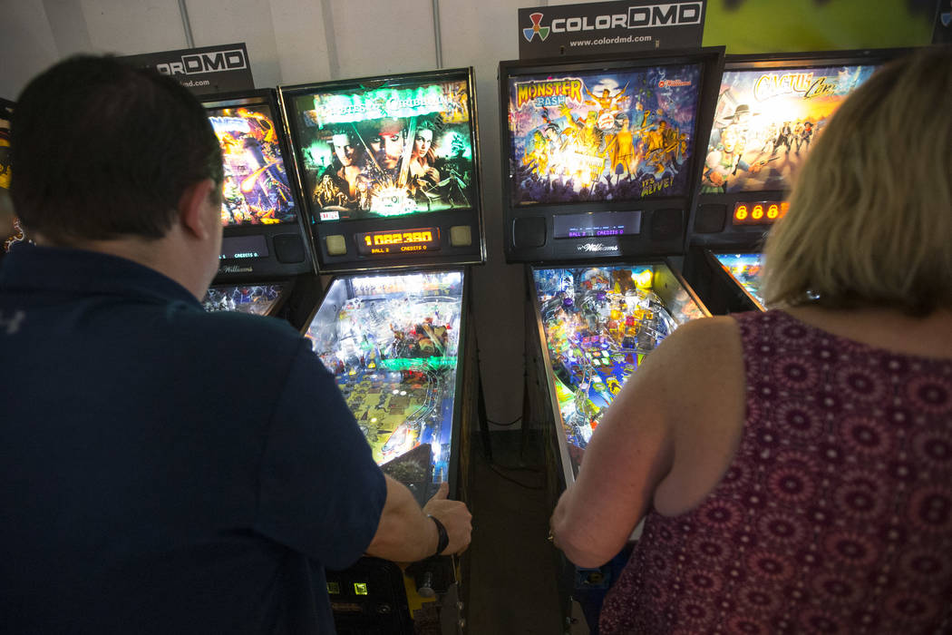Patrons play pinball machines during a visit to the Pinball Hall of Fame located at 1610 E. Tropicana Avenue in Las Vegas on Saturday, July 28, 2018. Richard Brian Las Vegas Review-Journal @vegasp ...