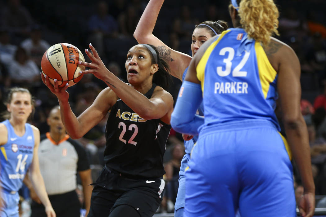 Las Vegas Aces center A'ja Wilson (22) shoots past the Chicago Sky during the second half of a WNBA basketball game at Mandalay Bay Events Center in Las Vegas on Thursday, July 5, 2018. Chase Stev ...