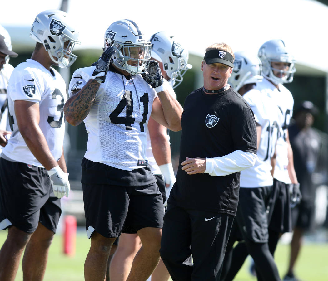 Head Coach Jon Gruden works with the offensive unit at the Oakland Raiders training camp in Napa, Calif., Friday, July 27, 2018. Heidi Fang Las Vegas Review-Journal @HeidiFang