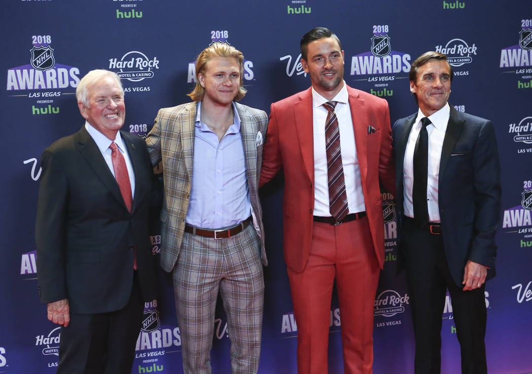 Golden Knights owner Bill Foley, from left, joins players William Karlsson and Deryk Engelland along with George McPhee, general manager, on the red carpet ahead of the NHL Awards at the Hard Rock ...