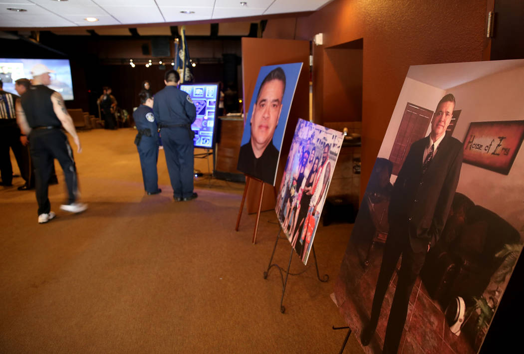 Photos of Las Vegas Corrections Officer Kyle Eng are displayed during his funeral at Canyon Ridge Christian Church Monday, July 20, 2018. K.M. Cannon Las Vegas Review-Journal @KMCannonPhoto
