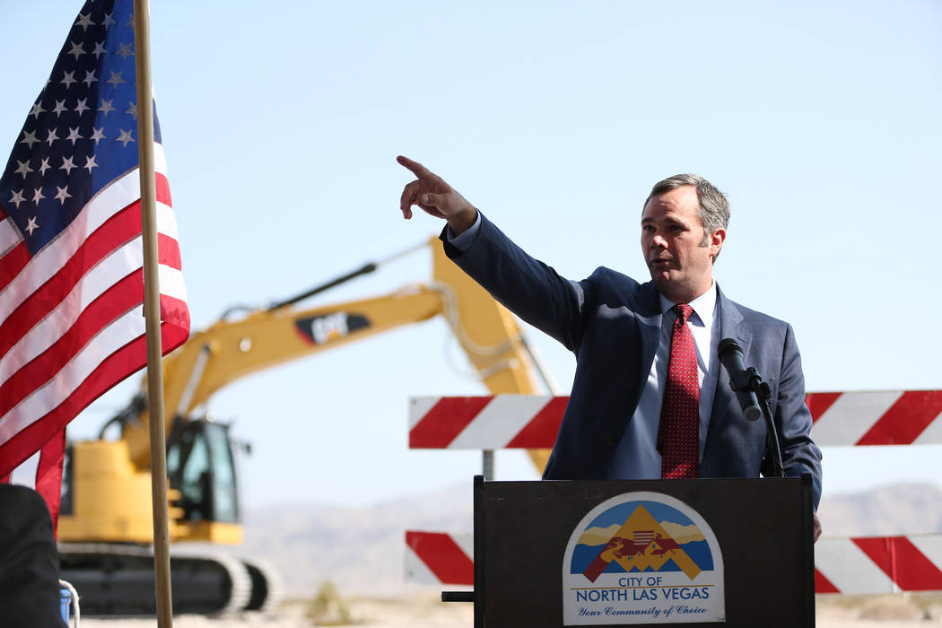 North Las Vegas City Manager Ryann Juden points during ceremonies to begin construction of a water pipeline in North Las Vegas, Tuesday, July 31, 2018. The pipeline will provide water for industri ...