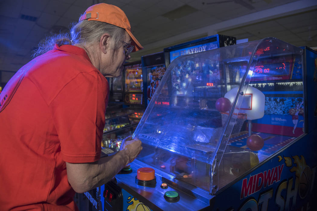 Pinball Hall of Fame owner Tim Arnold, plays Midway's Hot Shot, a basketball game, at his museum at 1610 E. Tropicana Ave. in Las Vegas on Thursday, April 14, 2016. (Martin S. Fuentes/Las Vegas Re ...