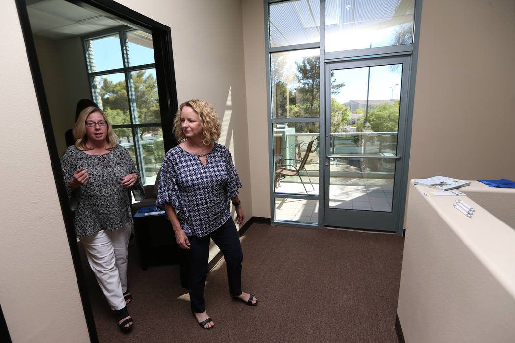 Center for Hope's CEO Amy Gerberry, left, and registered diabetes educator and dietitian Mary Dunaway, tour the newly opened Center for Hope, an eating disorder treatment facility, during an open ...