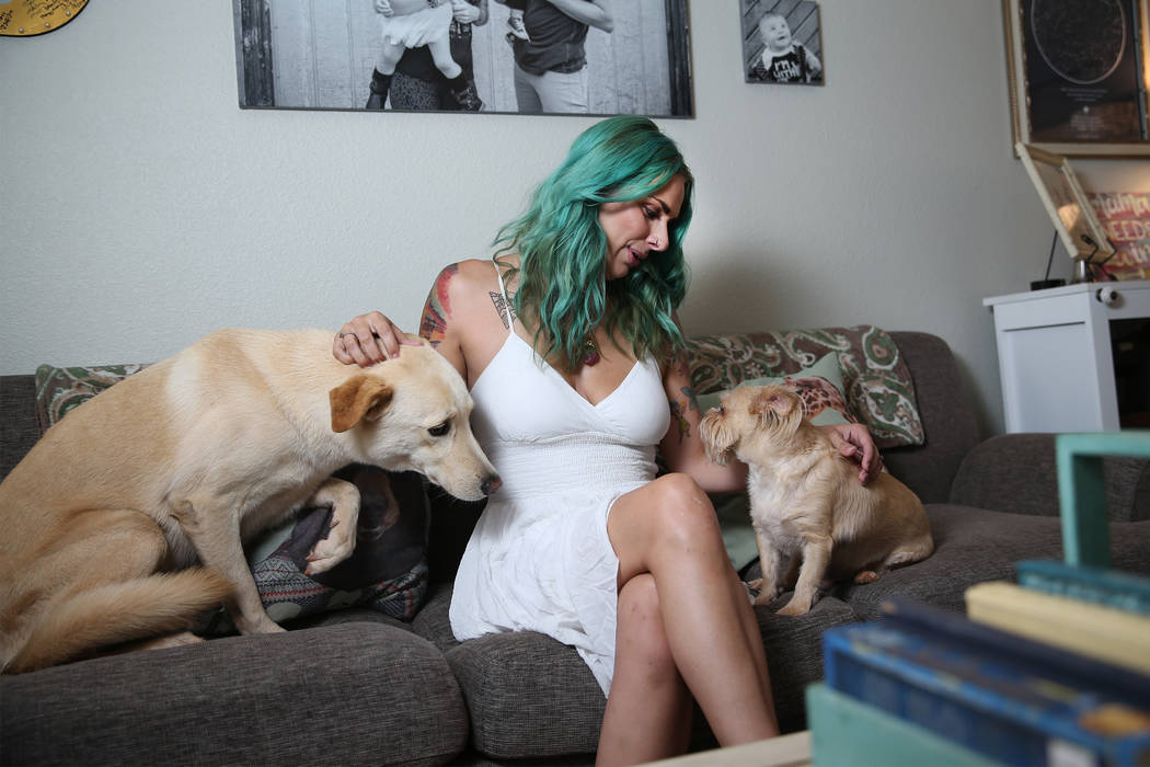 Cassi Davis, organizer of the Las Vegas Crush Run, with her dogs at her home in Las Vegas, Friday, July 13, 2018. Davis was diagnosed with depression and anxiety after her second child was born an ...