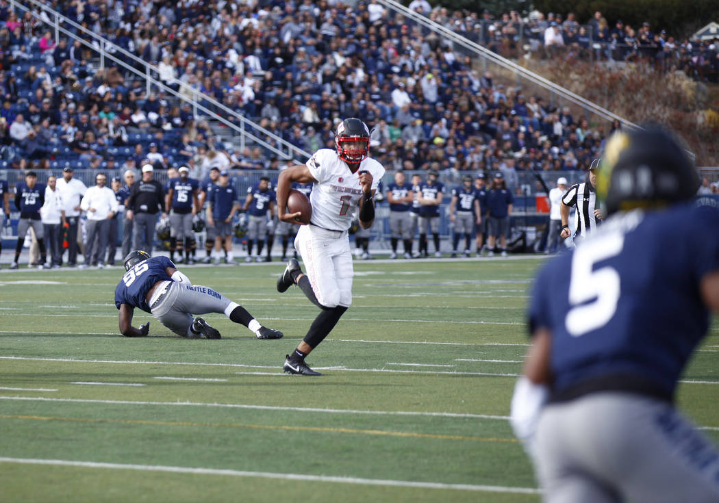 UNLV Rebels quarterback Armani Rogers (1) runs with the football during the first half of their game against the Nevada Wolf Pack in Reno, Saturday, Nov. 25, 2017. Heidi Fang Las Vegas Review-Jour ...