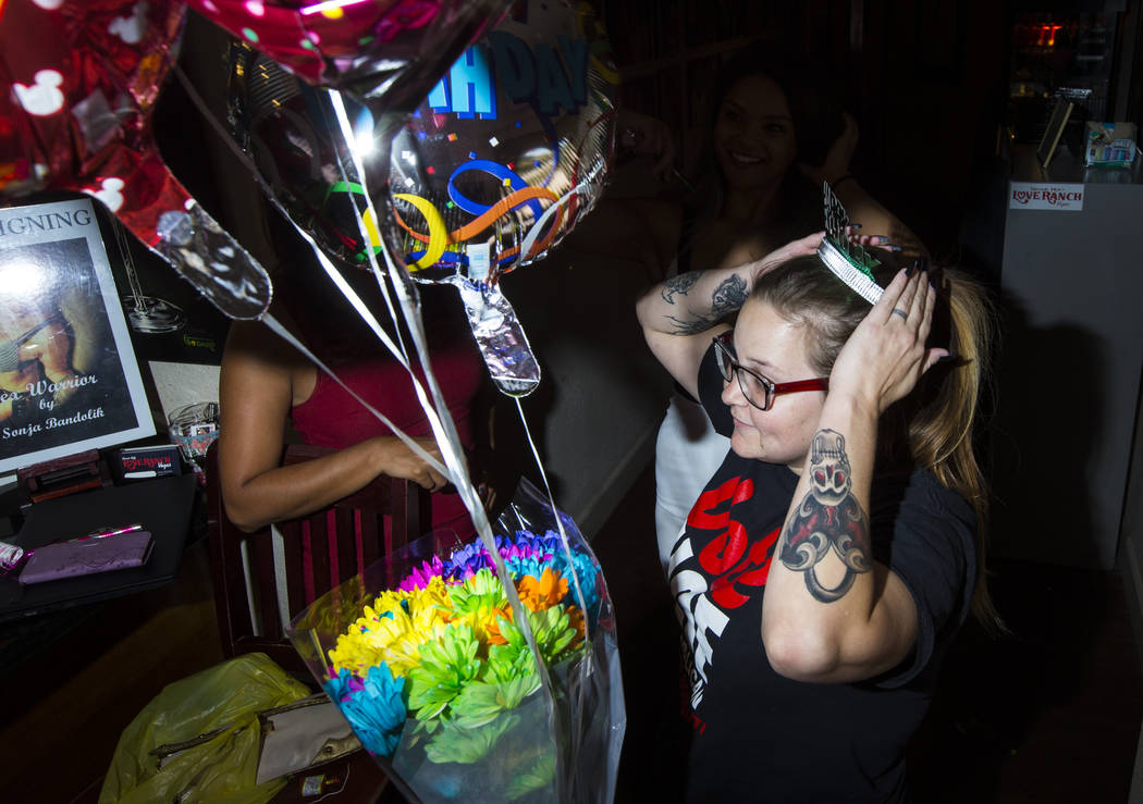 Jackie Williams, "house mom" at the Love Ranch brothel, enjoys her birthday celebrati ...