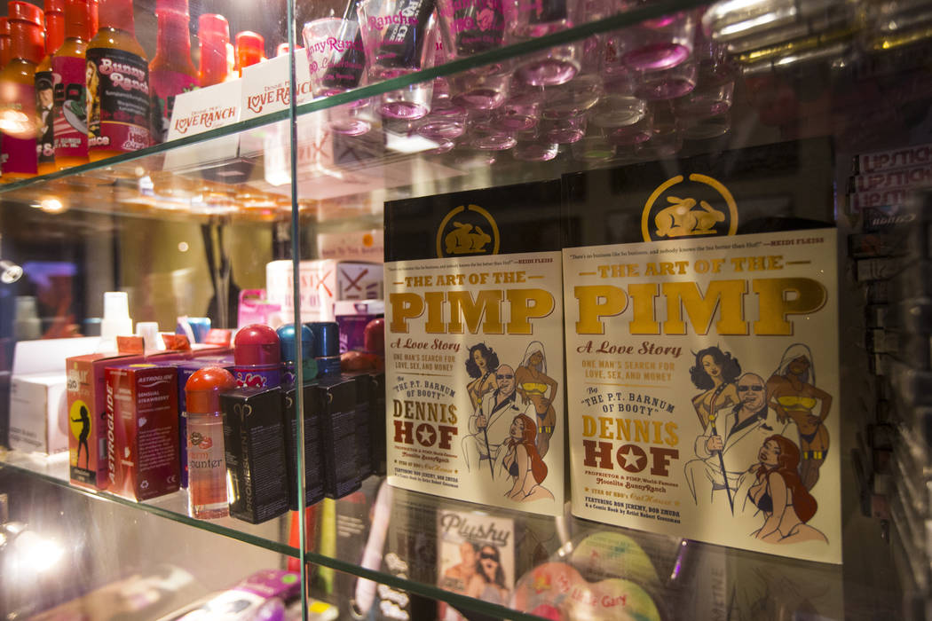 Copies of "The Art of the Pimp" book by brothel owner Dennis Hof at the Love Ranch br ...