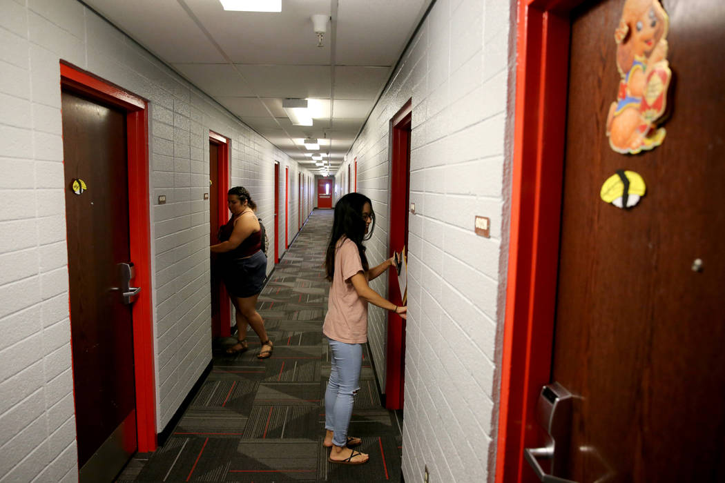 UNLV senior Angelyn Tabalba, right, enters her dorm room in the Tonopah Complex Thursday, July 26, 2018. K.M. Cannon Las Vegas Review-Journal @KMCannonPhoto