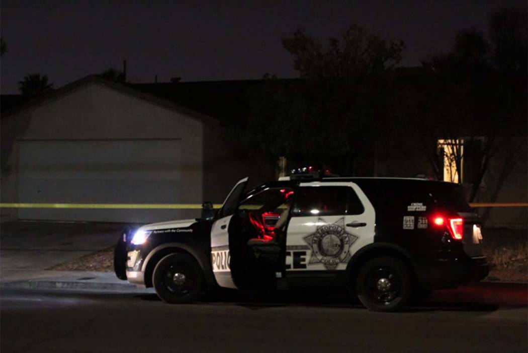 Las Vegas police investigate a call of a home intruder on Wednesday, Aug. 1, 2018, at a house on San Vincente St. (Max Michor/Las Vegas Review-Journal)