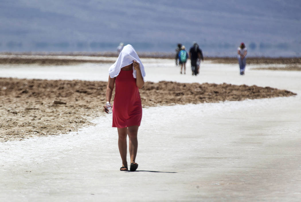 Diana Senci of the Netherlands visits Badwater Basin, 282 feet below sea level, in Death Valley National Park, Calif., Thursday, July 26, 2018. Richard Brian Las Vegas Review-Journal @vegasphotograph