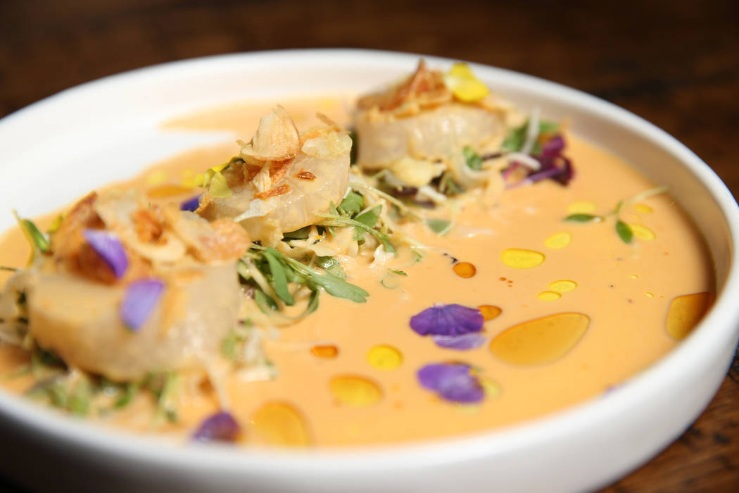 The scallop sashimi is served with sesame-uni leche de tigre and crispy onion, at Once restaurant at the Palazzo hotel-casino in Las Vegas, Wednesday, Aug. 1, 2018. Erik Verduzco Las Vegas Review- ...