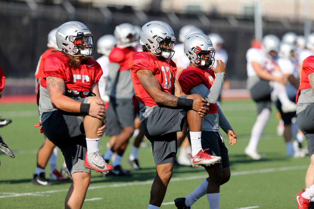 UNLV strong safety Evan Austrie (17), center, during practice at Rebel Park on the UNLV campus Monday, Aug. 6, 2018. K.M. Cannon Las Vegas Review-Journal @KMCannonPhoto