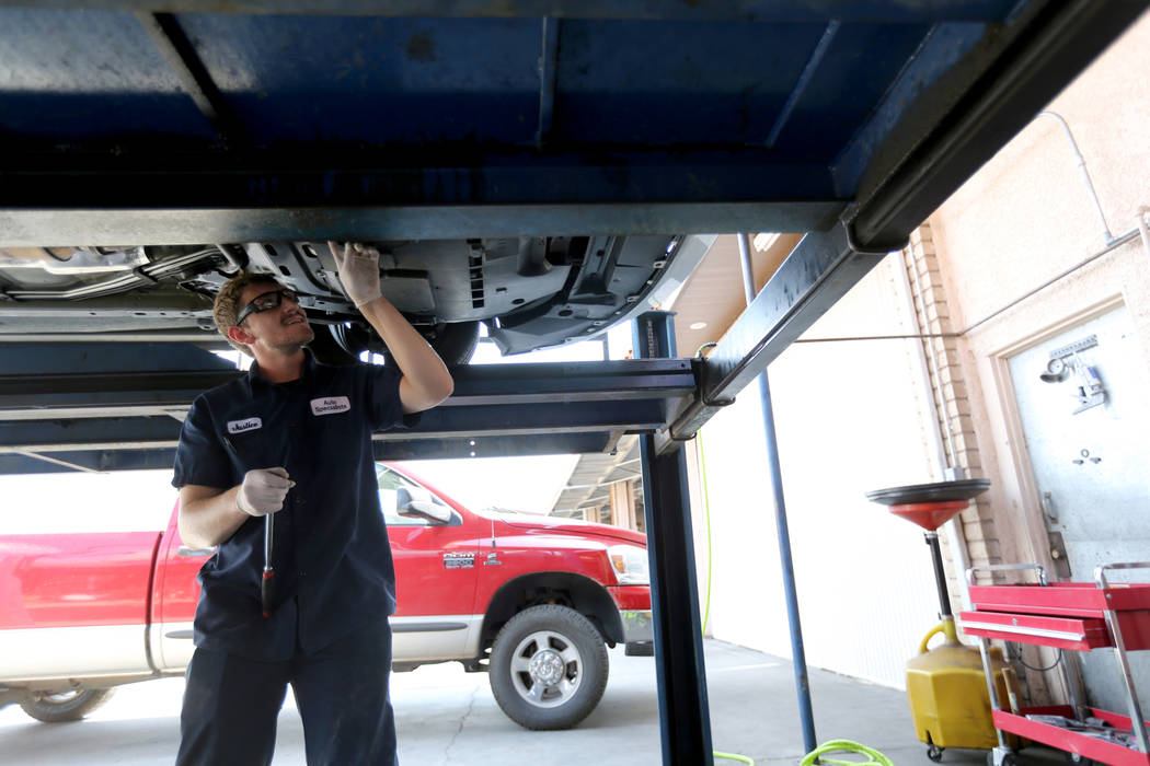 Lube technician Justice Erickson works on a car at Auto Specialists at 705 Juniper Way in Boulder City Wednesday, Aug. 1, 2018. K.M. Cannon Las Vegas Review-Journal @KMCannonPhoto