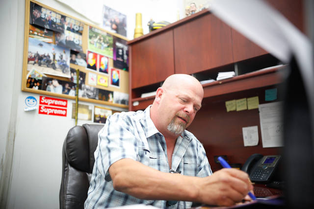 Rick Harrison of the reality TV show "Pawn Stars" signs autographs at Gold & Silver Pawn shop in downtown Las Vegas on Thursday, July 17, 2014. (Chase Stevens/Las Vegas Review-Journal)