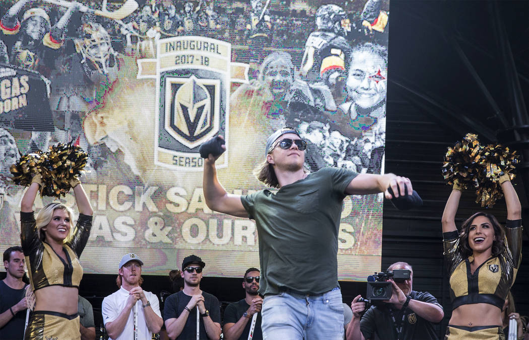 Golden Knights center William Karlsson throws a shirt into the crowd during “Stick Salute to Vegas and Our Fans” on Wednesday, June 13, 2018, at the Fremont Street Experience, in Las ...