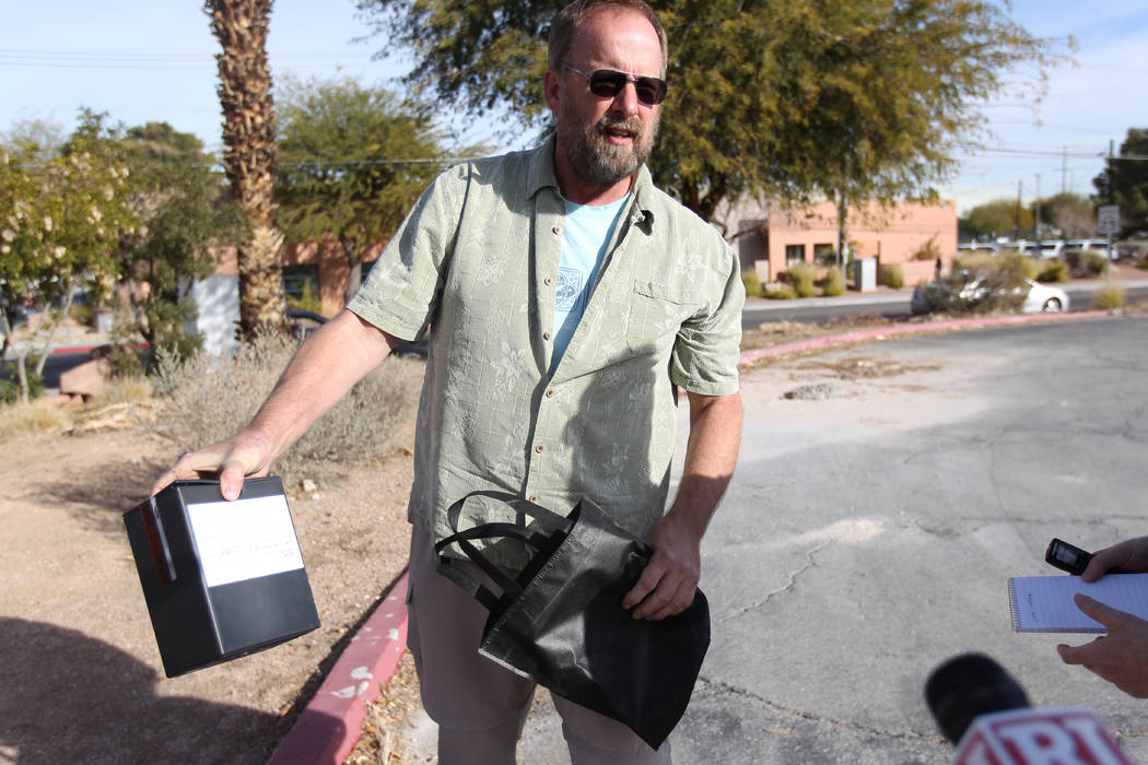 Eric Paddock, brother of Las Vegas gunman Stephen Paddock, shows the remains of his brother during an interview outside the Clark County coroner's office in Las Vegas on Jan. 18, 2018. K.M. Cannon ...