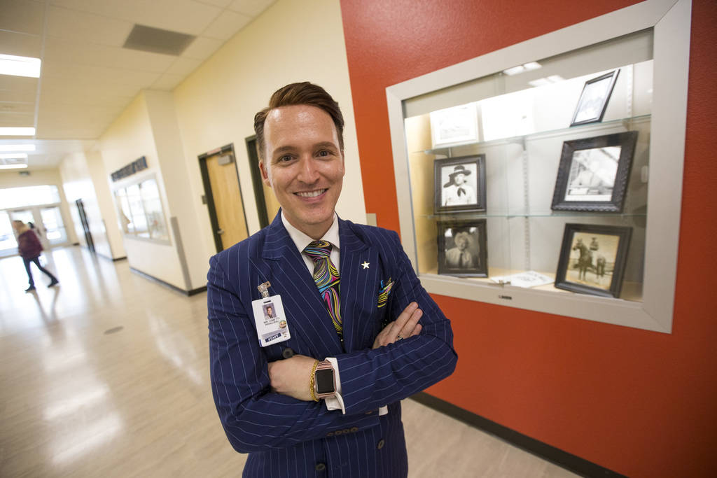 Rex Bell Principal Jaymes Aimetti poses next to a tribute to Rex Bell near the school's main entrance in Las Vegas on Wednesday, Aug. 8, 2018. Richard Brian Las Vegas Review-Journal @vegasphotograph