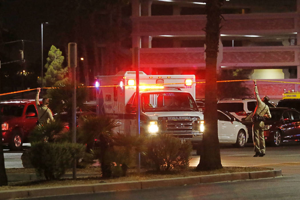 An ambulance leaves a parking lot outside Boulder Station in Las Vegas, Saturday, July 28, 2018. According to Las Vegas police, two people were shot outside Boulder Station on Saturday night. Chit ...