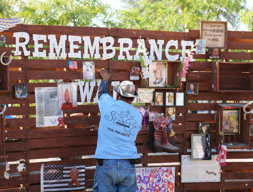 The Remembrance Wall at the Community Healing Garden in Las Vegas, Monday, Aug. 6, 2018. Crews moved the wooden wall to make way for construction on a permanent wall, set to begin within the week. ...