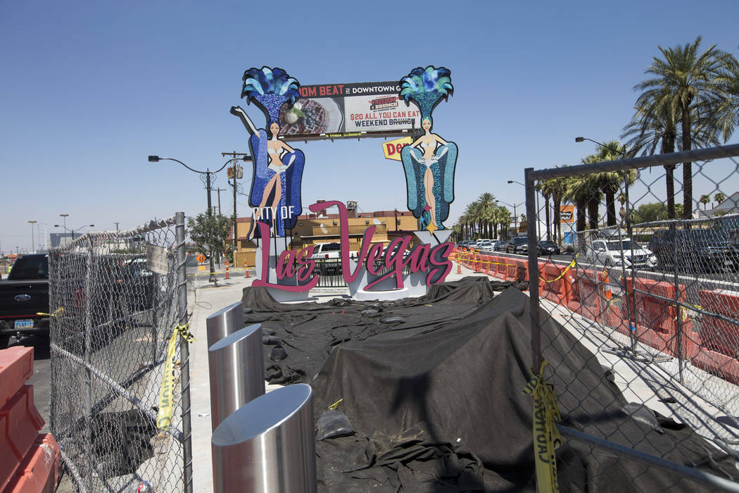 A new city of Las Vegas sign, complete with two showgirls and a roulette table, has been built at the corner of Las Vegas Boulevard and Main Street in downtown Las Vegas on Monday, Aug. 6, 2018. R ...