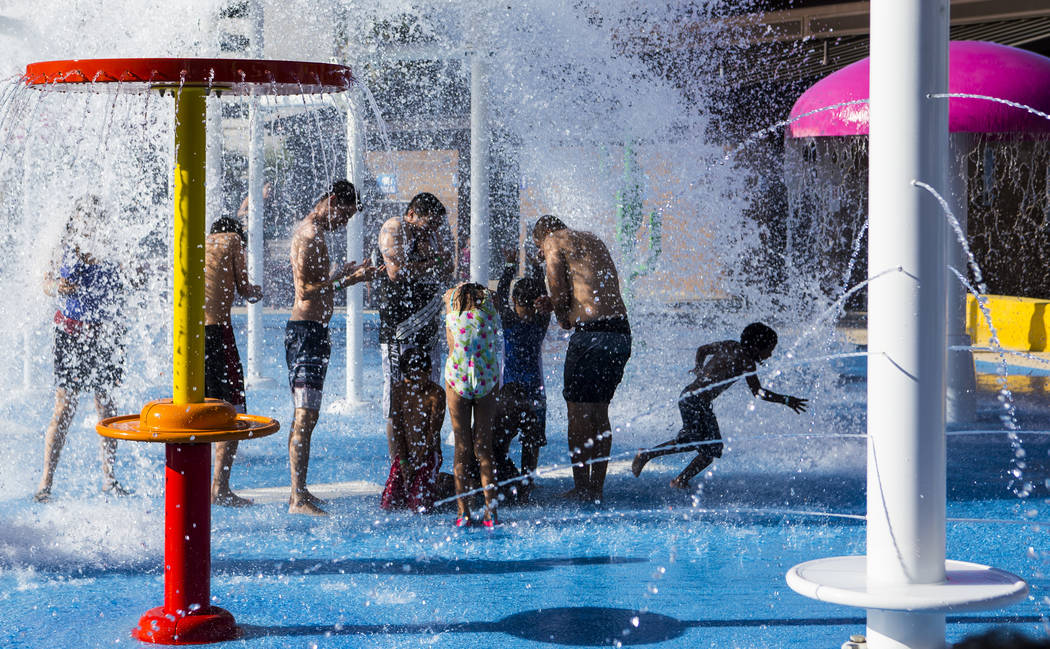 Hotel guests enjoy a water feature at the pool area at Circus Circus in Las Vegas on Friday, June 22, 2018. Chase Stevens Las Vegas Review-Journal @csstevensphoto