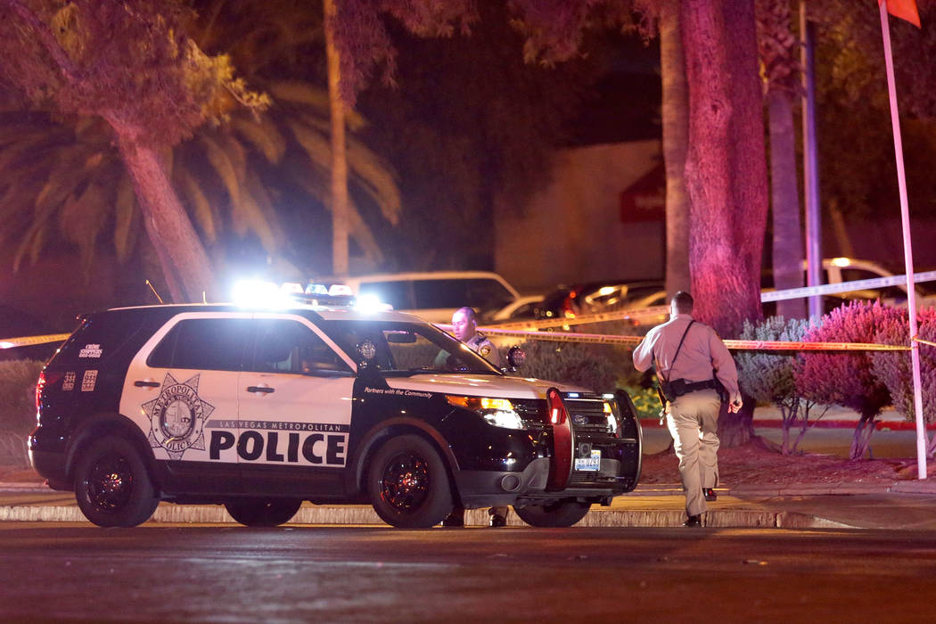 Las Vegas police investigate an officer-involved shooting near an apartment complex in the 5300 block of East Tropicana Avenue in Las Vegas, Wednesday, Aug. 8, 2018. Chitose Suzuki Las Vegas Revie ...