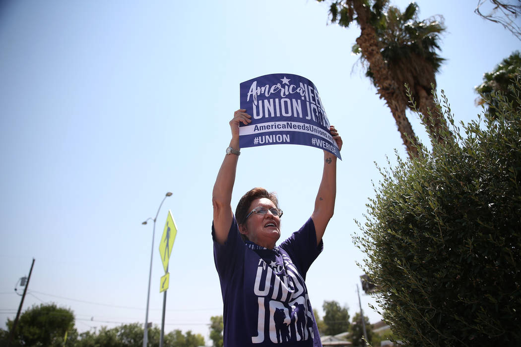 Union organizer Susan Smith participates during a protest by the Service Employees International Union (SEIU) Nevada Local 1107 outside of the Southern Nevada Regional Housing Authority, 380 N. Ma ...