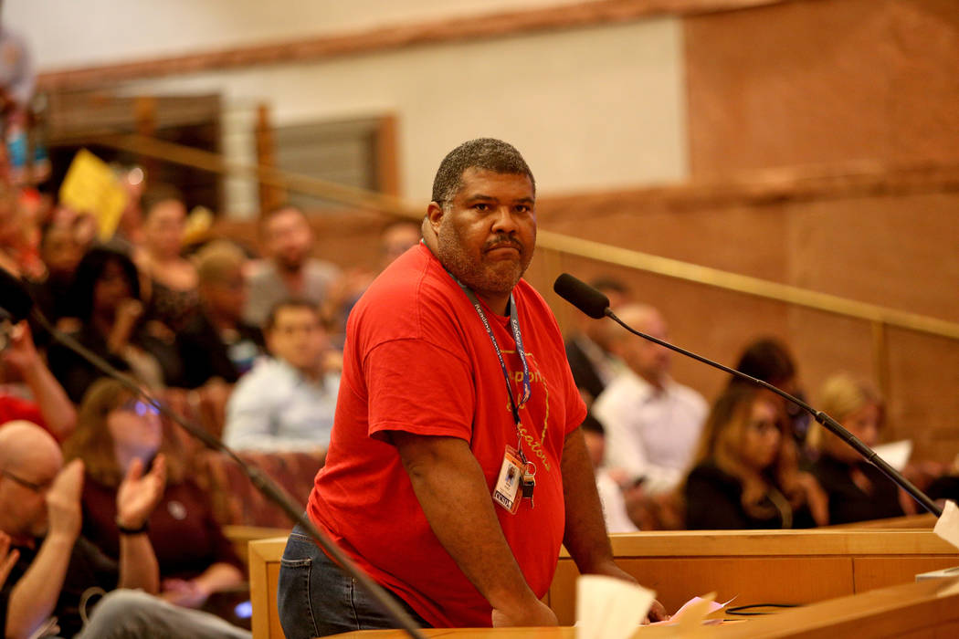 Erik Huey, a substitute teacher, speaks about how the district fails to invest in support staff at a Clark County School District board meeting at the Clark County Government Center in Las Vegas, ...