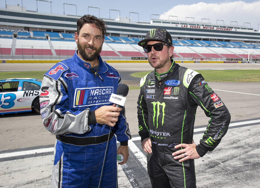 Vegas Golden Knights defenseman Deryk Engelland, left, and NASCAR driver Kurt Busch take questions from reporters during a media event on Monday, Aug. 13, 2018, at the Las Vegas Motor Speedway to ...