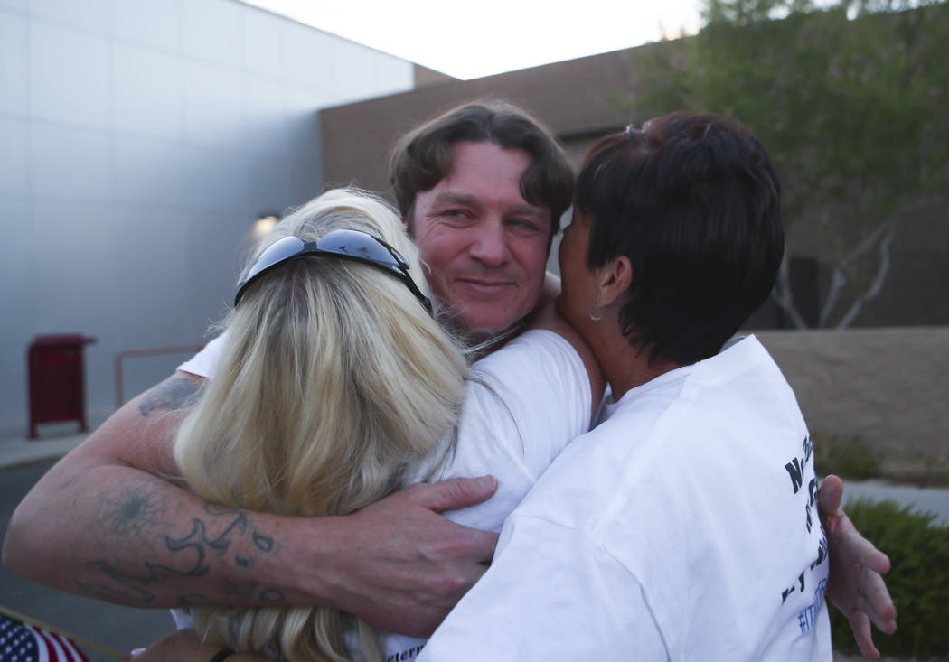 Steven Stewart is embraced after he and three other defendants in the Bunkerville standoff case were released at the Henderson Detention Center on Tuesday, Aug. 22, 2017. Chase Stevens Las Vegas R ...