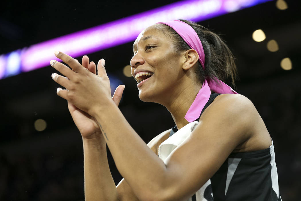 Las Vegas Aces center A'ja Wilson (22) reacts to a play by Aces guard Moriah Jefferson (4) during the first half of a WNBA basketball game against the Indiana Fever at the Mandalay Bay Events Cent ...