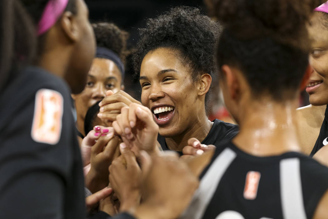 Las Vegas Aces forward Tamera Young (1) celebrates with teammates after defeating the Indiana Fever 92-74 in a WNBA basketball game at the Mandalay Bay Events Center on Saturday, Aug. 11, 2018. Ri ...