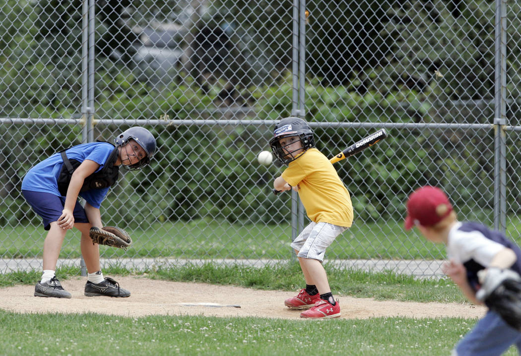 Sandlot sluggers recall youth baseball without uniforms, adults