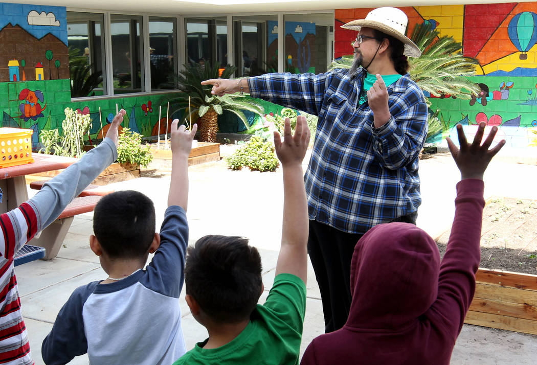 Enrique Garcia with Garden Farms teaches third-grade students at Woolley Elementary School in the Las Vegas school's garden Monday, Feb. 12, 2018. K.M. Cannon Las Vegas Review-Journal @KMCannonPhoto